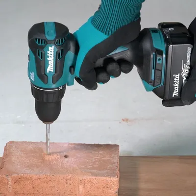 Дрель-шуруповерт ударная Makita DHP490WV, 18В, 13мм, 1×2,0Ач
