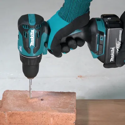 Дрель-шуруповёрт Makita DHP490F003, ударная, 18 В, 2×3 А·ч, 50 Нм, 13 мм